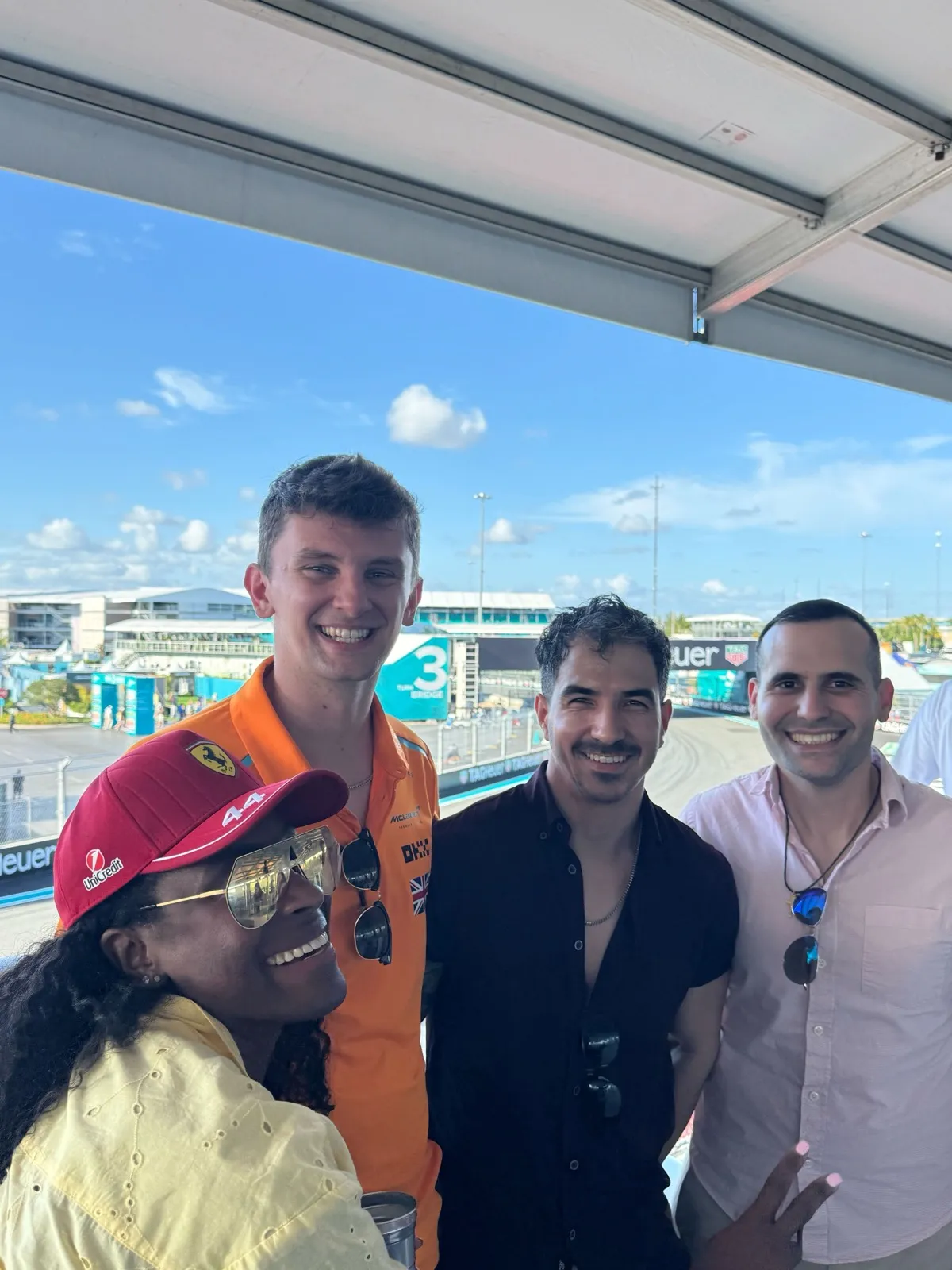 Rhea and teammates trackside at the Miami F1 Grand Prix